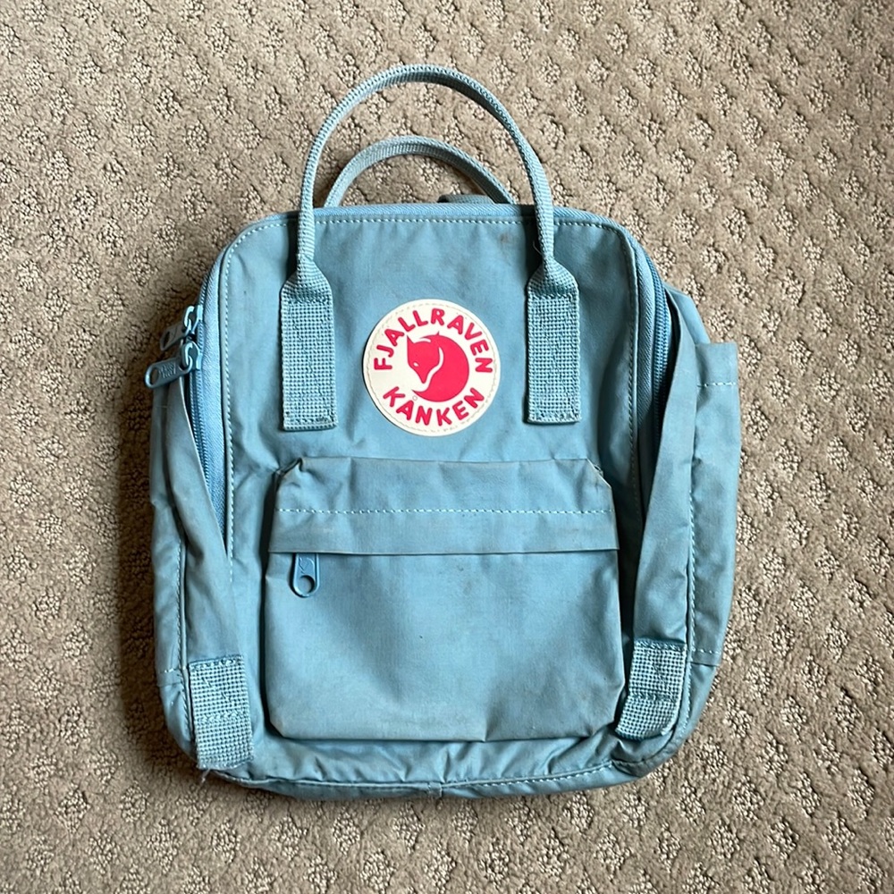 Fjallraven Kanken Mini Backpack in Light Blue with Red Logo